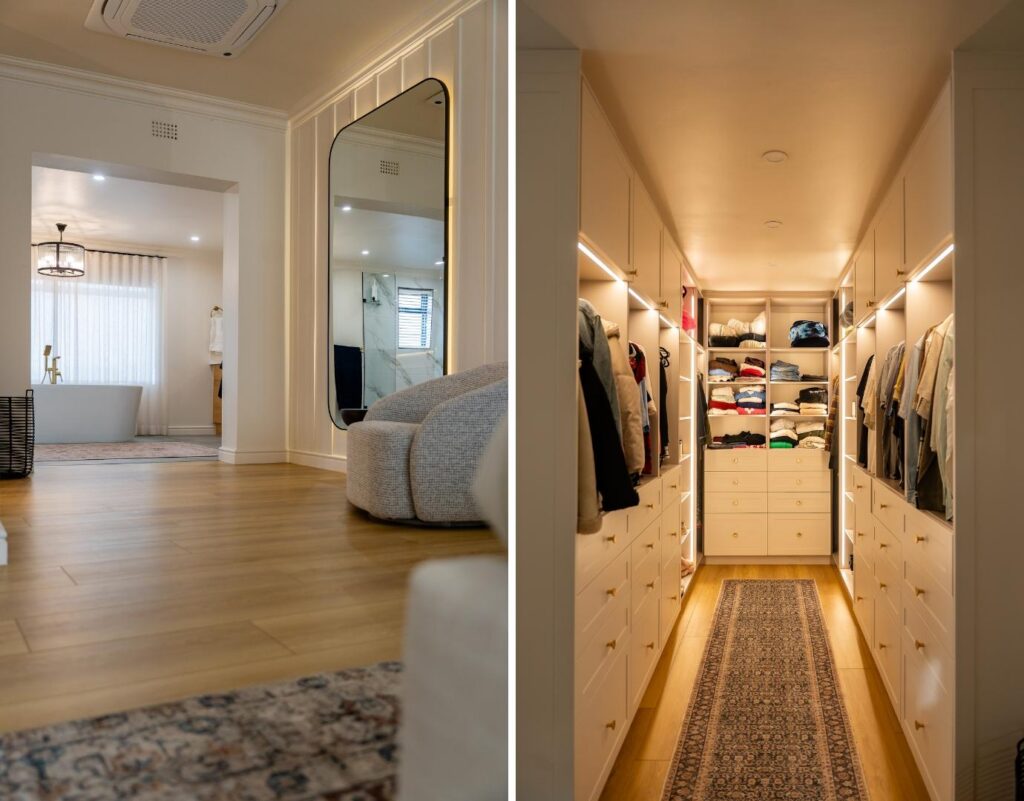 Side-by-side view of a luxury master suite: the left side shows a wide hallway with light oak vinyl floors leading past a back-lit arch mirror toward a bathroom with a freestanding tub; the right side shows a narrow walk-in closet featuring warm LED-lit white cabinetry and a patterned runner rug over wood-look flooring.